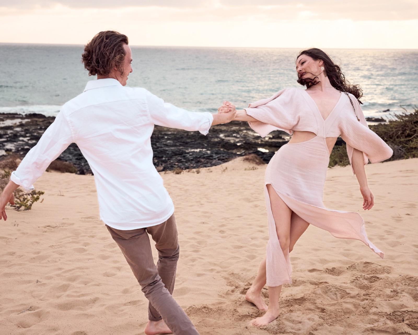 Winfried Ruhs and Avianna McKee on the beach